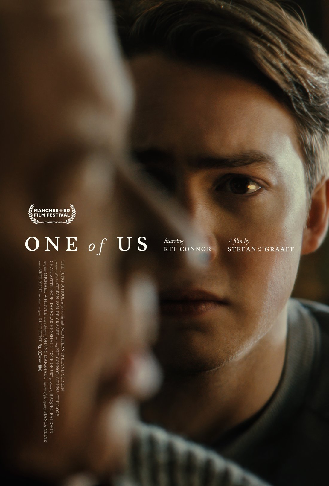 One of Us poster: Kit Connor in close-up, a blurred figure in the foreground