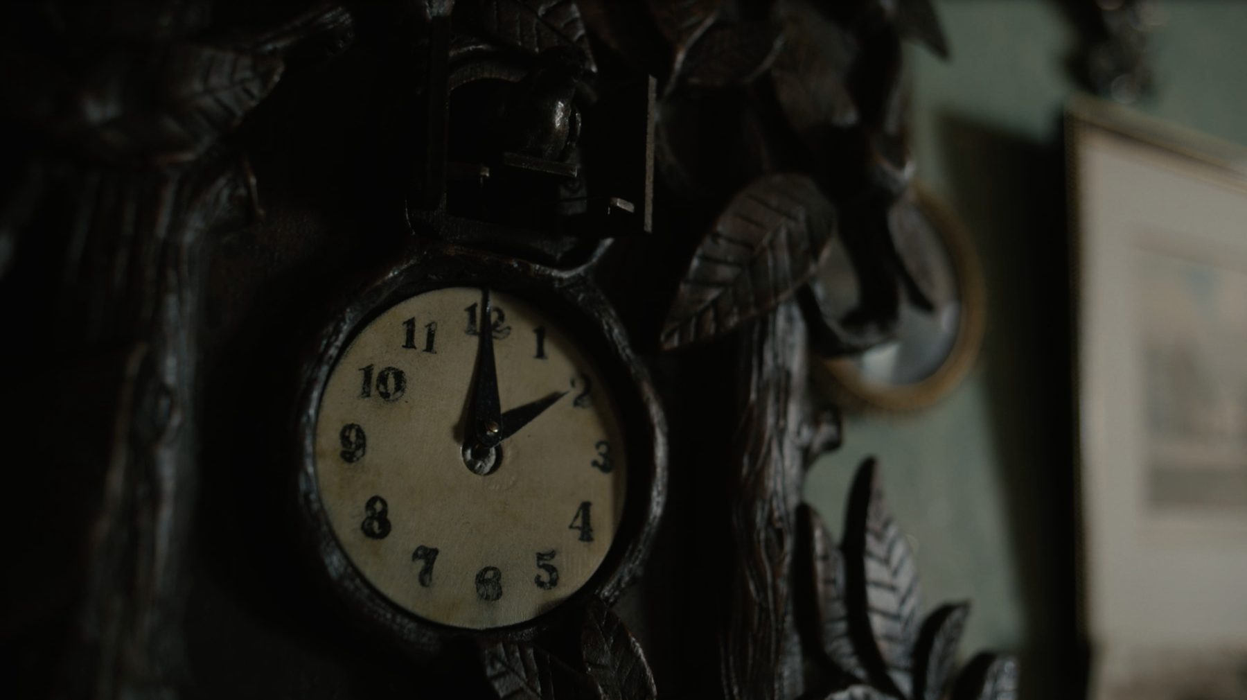 The carved wall clock